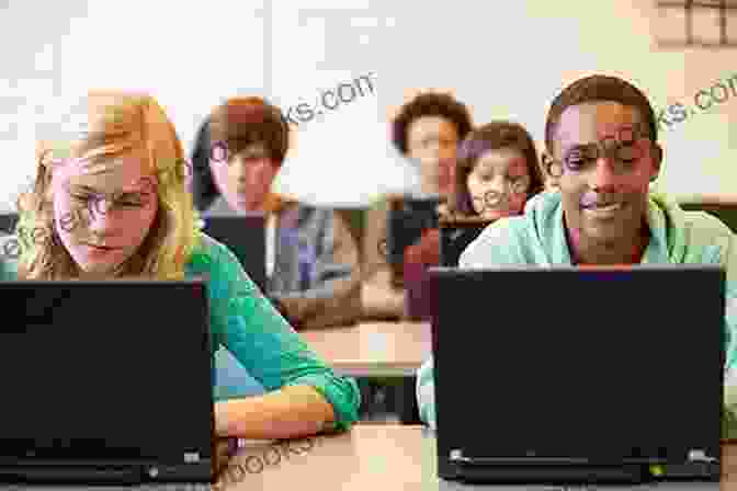 A Group Of Students Using Laptops In A Classroom Teaching Social Work With Digital Technology