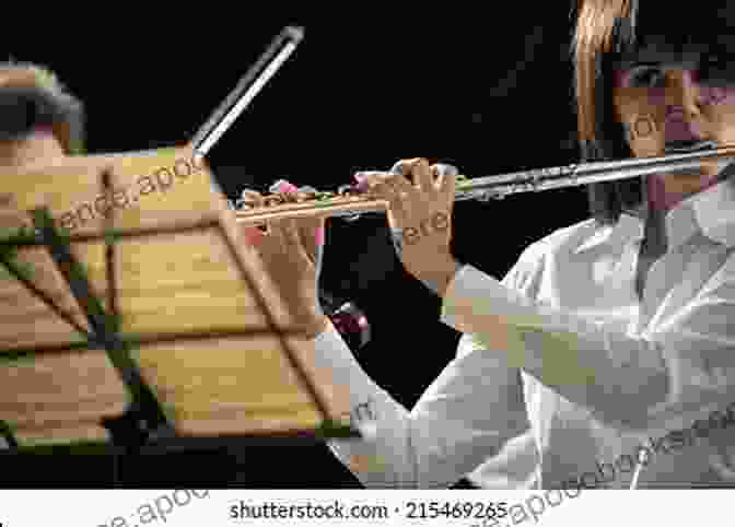 Flutist Performing On Stage HOW TO PLAY FLUTE: Your Complete Guide On How To Play Flute For Beginners